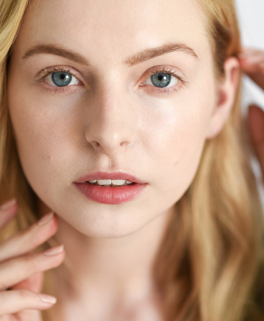 natural &amp; gentle arnica concealer applied on skin for even complexion 