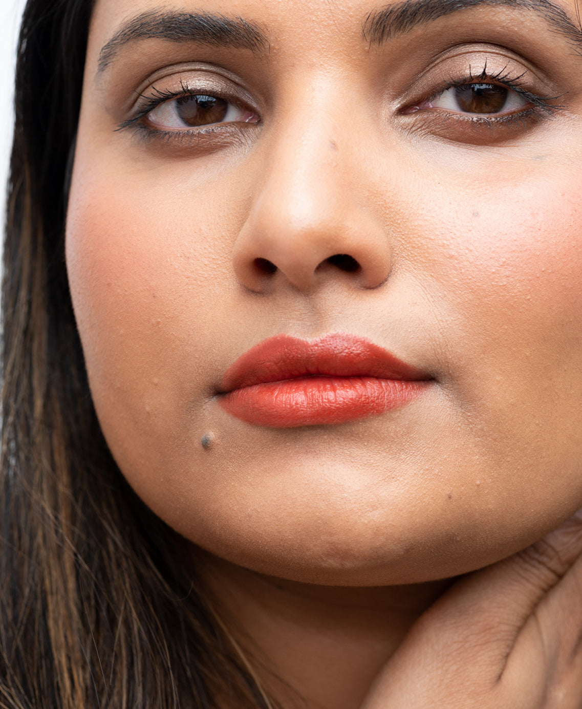 gentle organic coco crayon by Ere Perez applied on skin for multi-use colour to accentuate features  