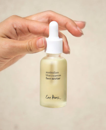 organic Australian blue cypress face nectar by Ere Perez in its eco-friendly glass bottle  | 